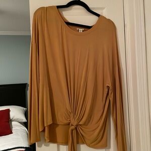 Sunny, loose tie-at-waist top. Dress up or down - fun with jeans too.